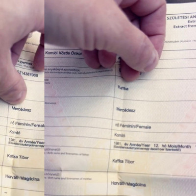 Kaffka Tranyó az anyakönyvi kivonatát mutogatja